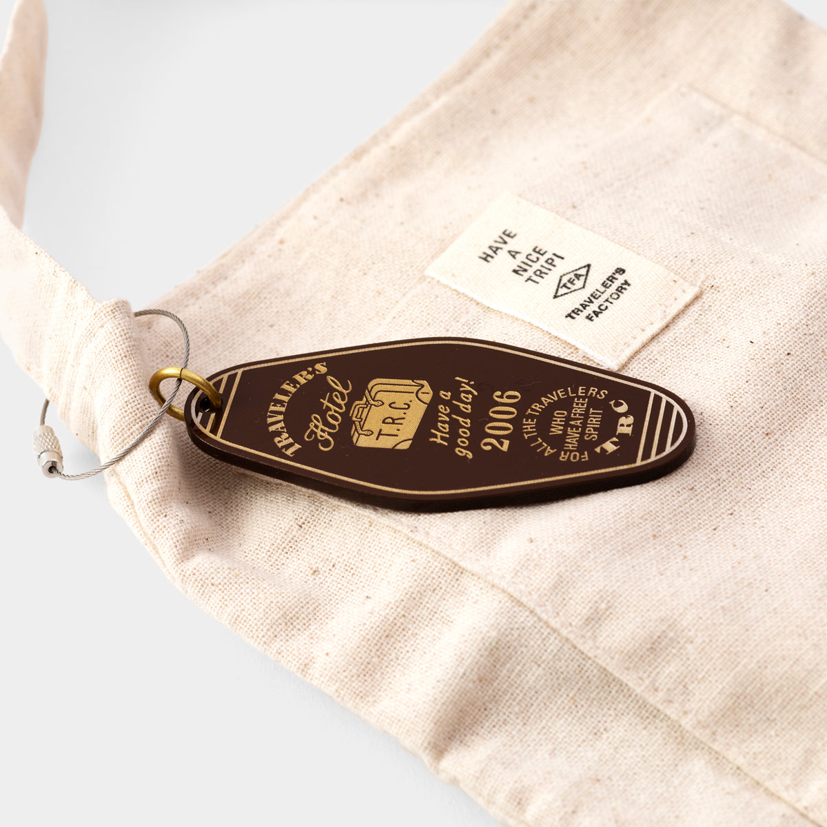 TF Traveler’s Hotel Acrylic Keychain  (07101044)